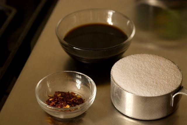 small bowls with soy sauce, red pepper flakes, and sugar