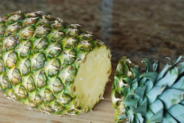 Top cut off of a pineapple