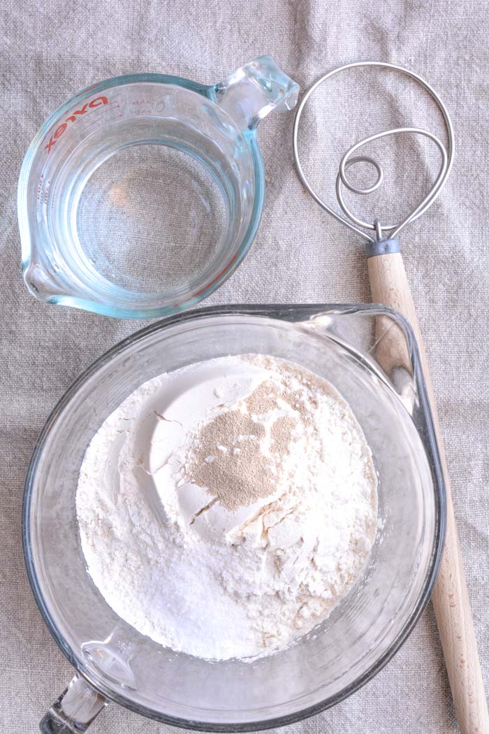 No knead crusty bread ingredients in a bowl