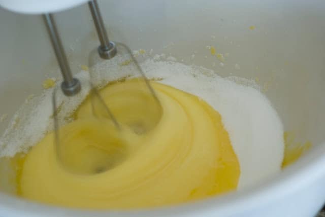 mixer beating eggs and sugar