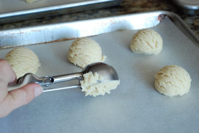cookie dough scooped onto baking sheet
