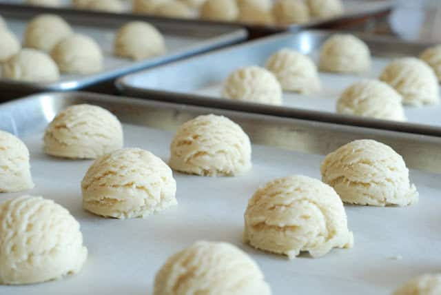 mounds of cookie dough on baking sheets