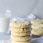 stacked sugar cookies glass of milk