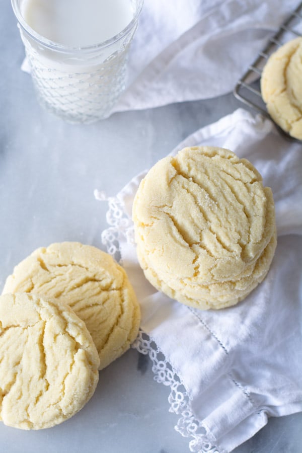 stacked sugar cookies on a cloth