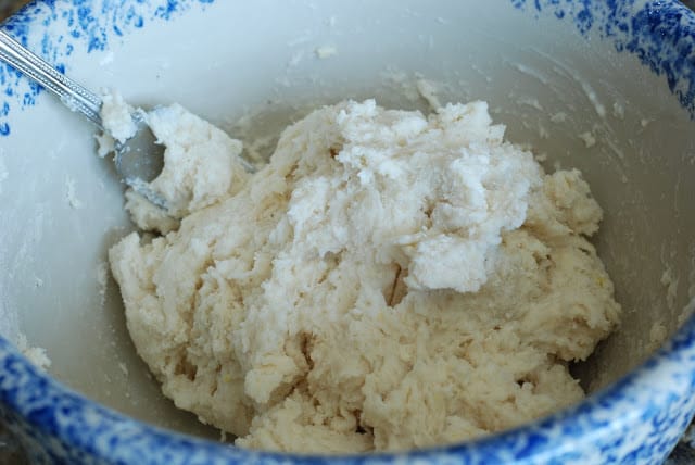 fork mixing shortbread ingredients in bowl
