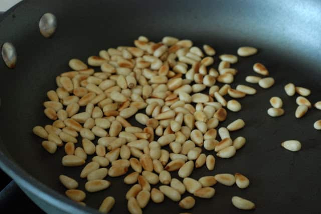 toasted pinenuts in skillet