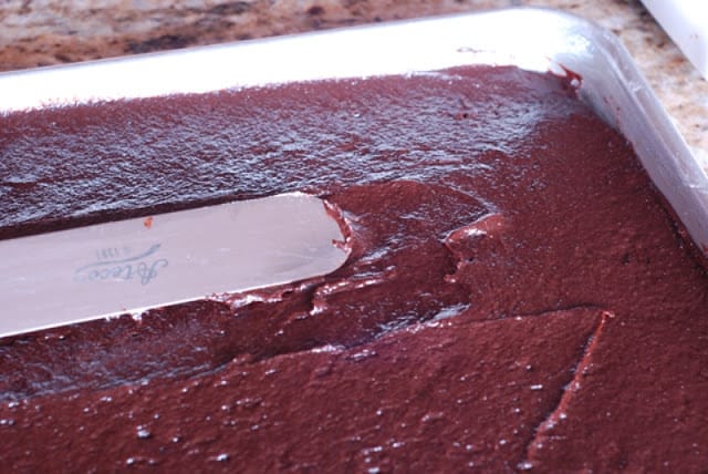 Spreading brownie mixture in baking pan