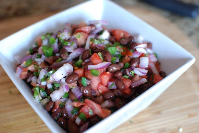 Black bean salsa in white bowl