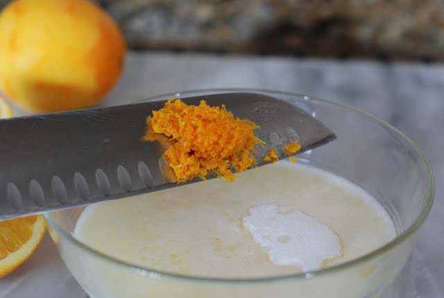 Orange zest added to butter sugar mixture