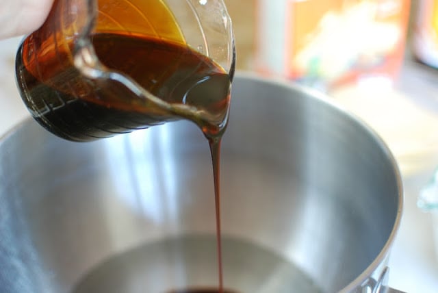 Molasses pouring into bowl