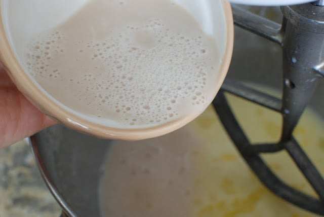 Pouring yeast mixture into eggs, and milk mixture