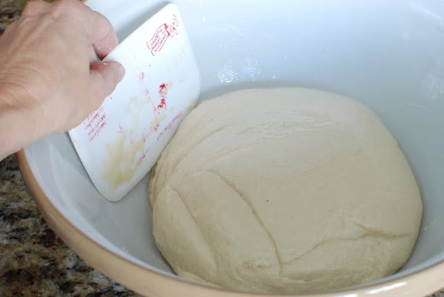 Mixed Donut dough in a large oil bowl.