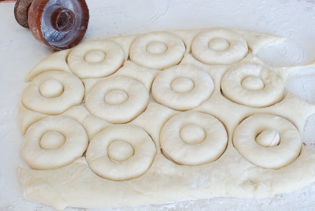 Several spudnuts cut from dough
