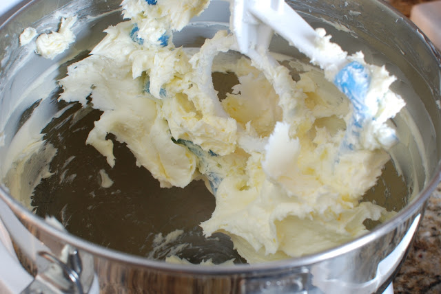 Beaten butter in stainless bowl