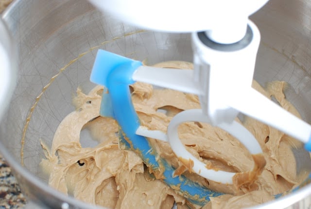 Mixing bowl blending butter and peanut butter