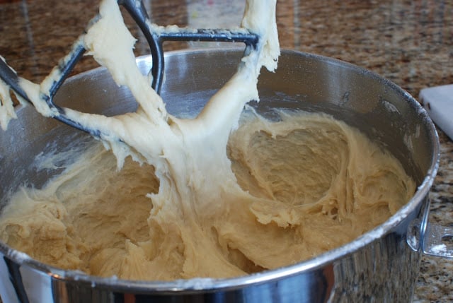 Mixing beater pulling on mixed dough.