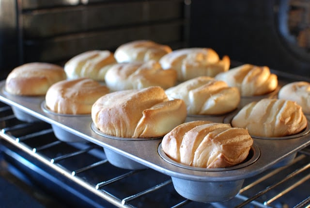 Baked butter flake rolls in a baking tin.