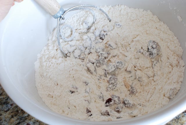 dried cranberries and pecans stirred into flour mixture