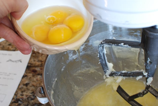 Eggs added to mixing bowl.