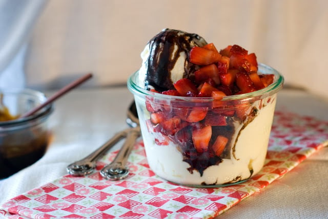 Ricotta gelato with fresh strawberries topped with balsamic glaze
