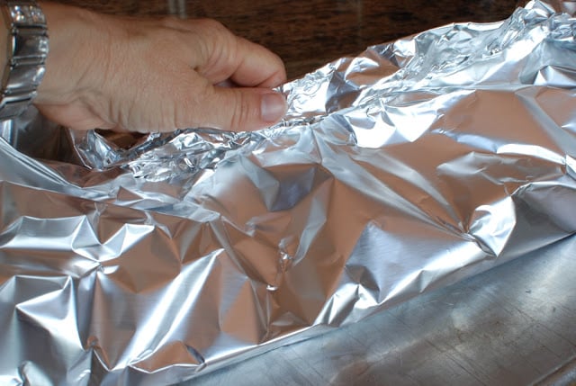 Ribs wrapped in foil.
