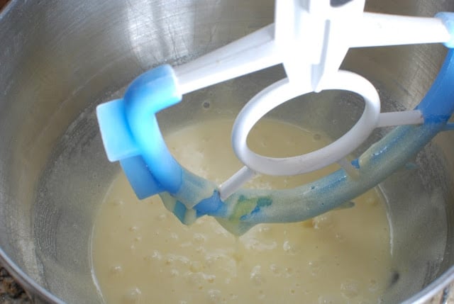 beaten eggs and sugar in bowl of mixer