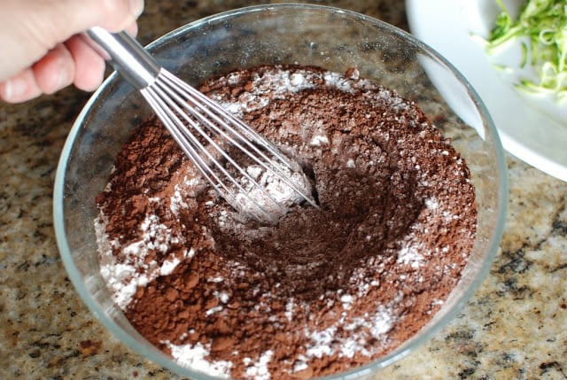 flour, cocoa powder, salt, baking soda whisked in glass bowl
