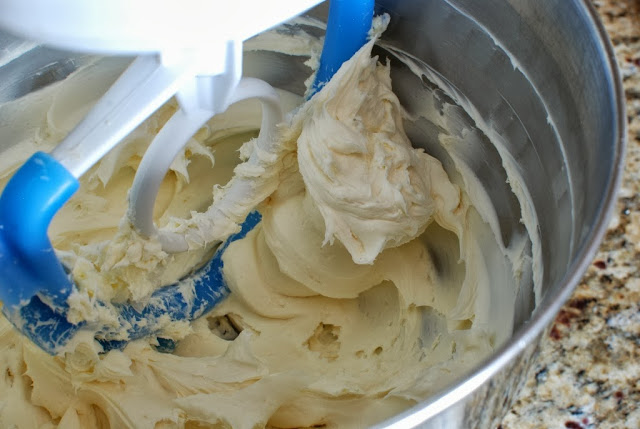 Large mixing bowl with beaten cream cheese and butter