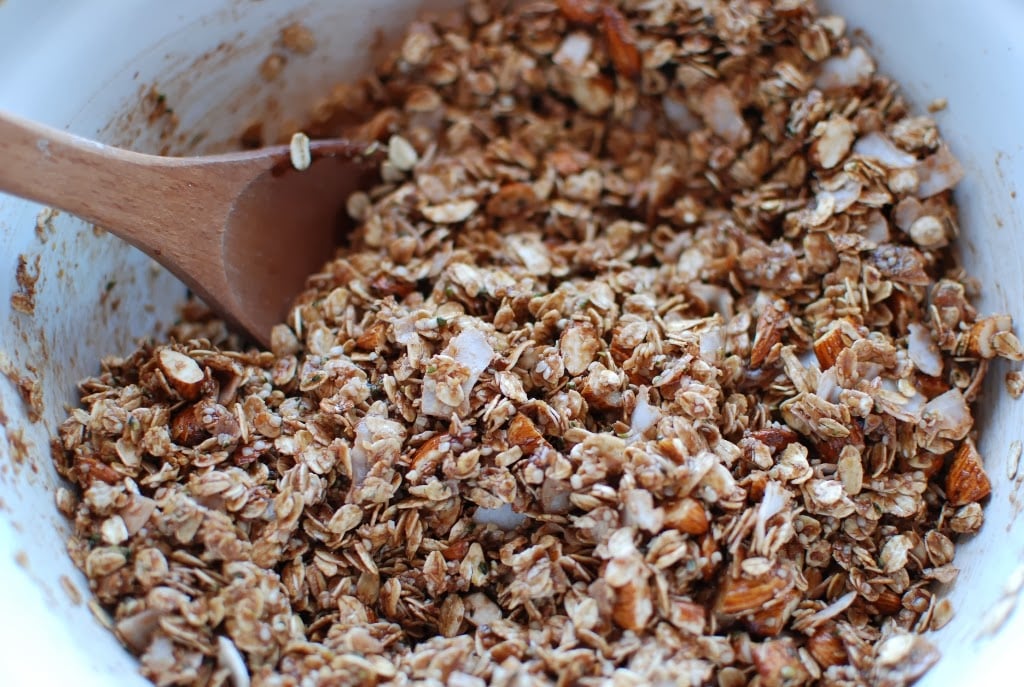 granola mixture being stirred