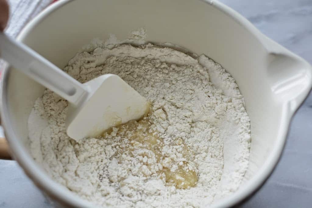 Spatula stirring in flour