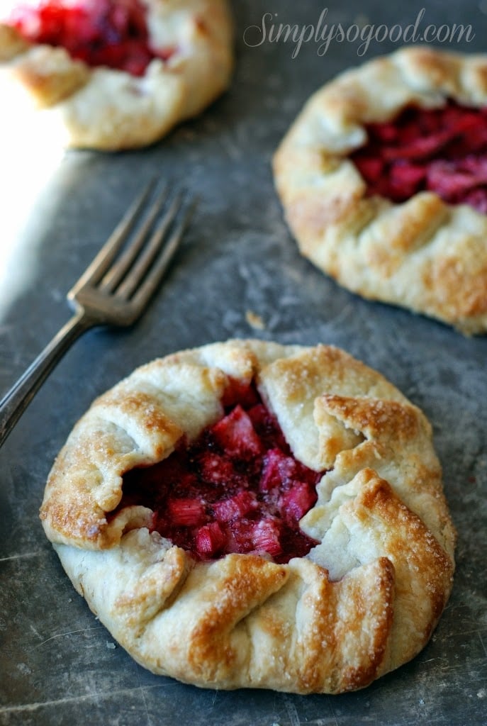 baked tarts with fork