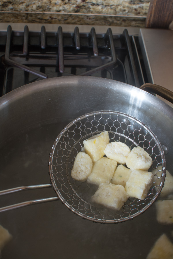 gnocchi in wire spider over boiling water