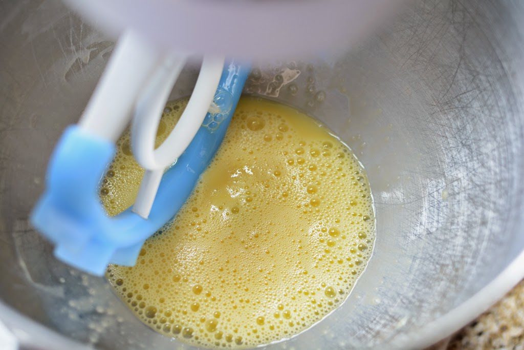 Beaten eggs in mixing bowl.