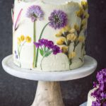 pressed flowers decorate lemon olive oil cake