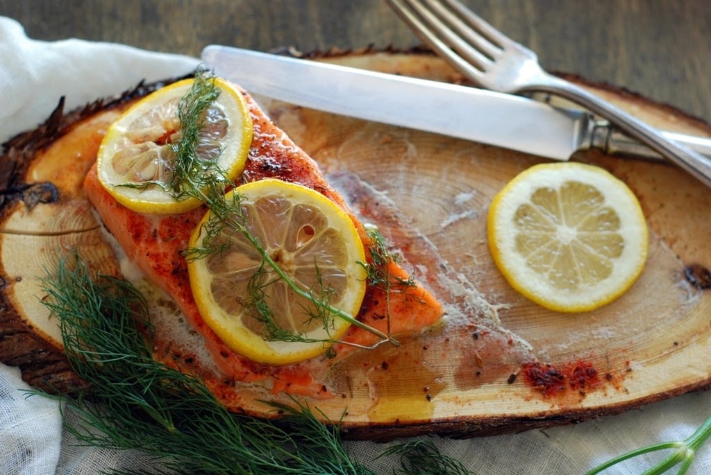 salmon on a cedar plank with lemon