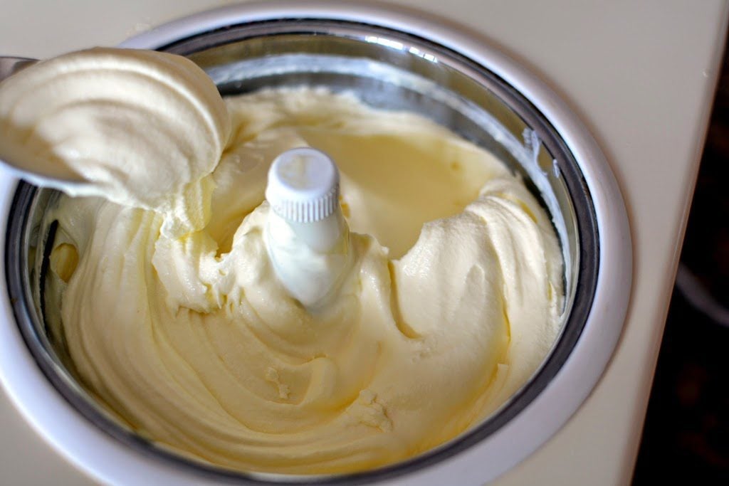 Smooth churned frozen vanilla ice cream in ice cream maker