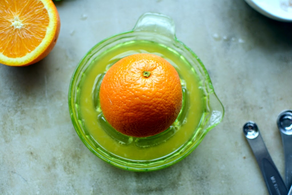 fresh orange on juicer