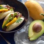 Beef filled steamed buns with avocado and mango