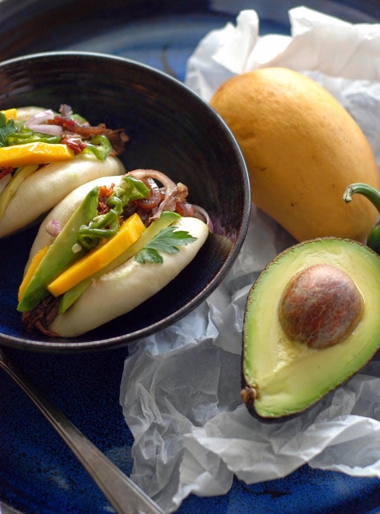 Beef filled steamed buns with avocado and mango