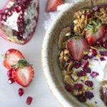 yogurt bowl with strawberries, pomegranates