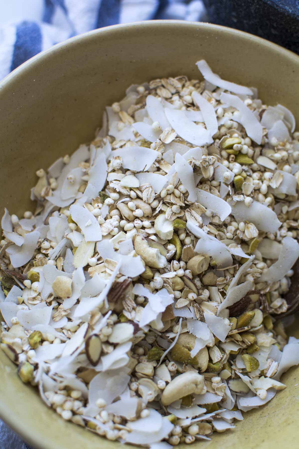 Gold bowl with nut and oat mixture