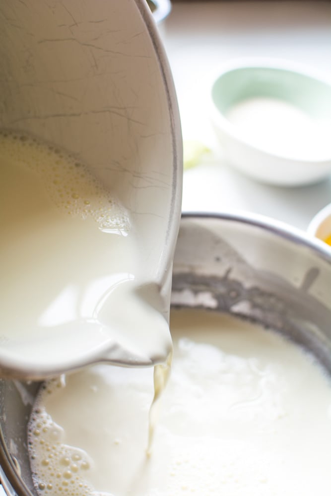 milk pouring into a pot