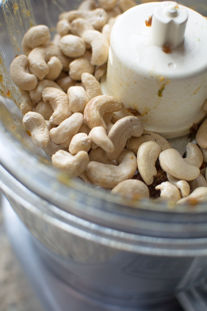 Raw cashews in a food processor