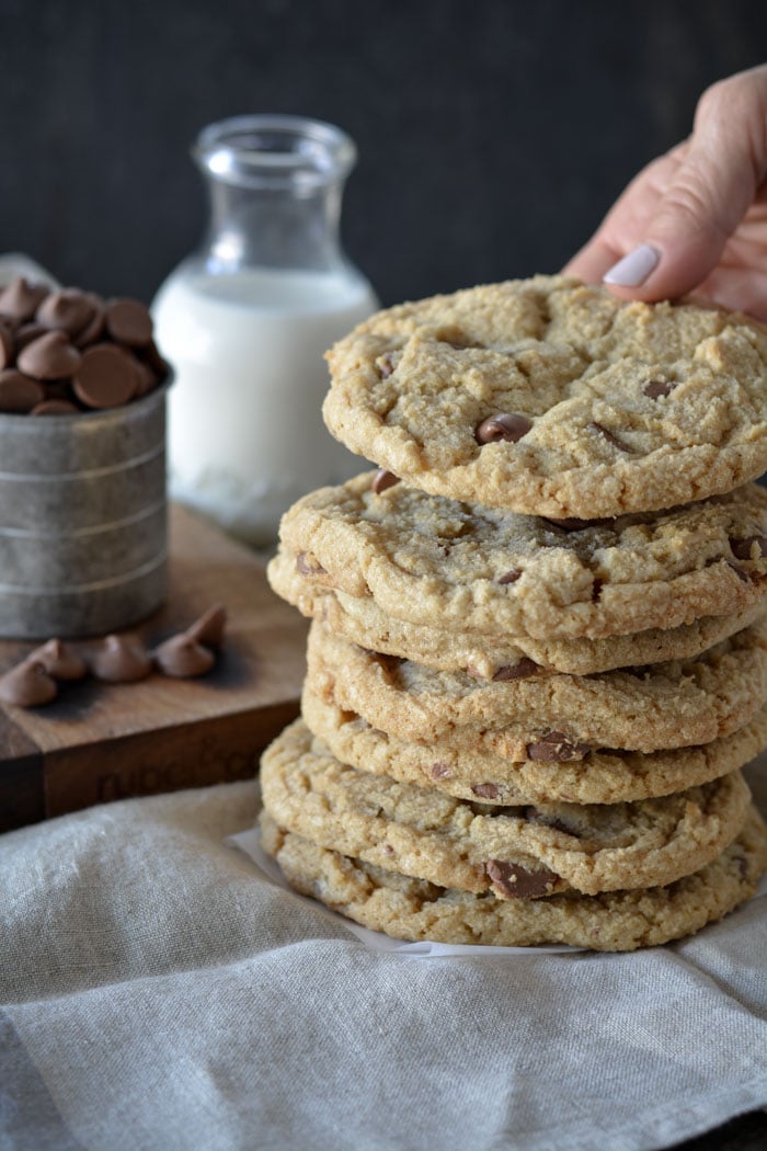 Jumbo Chocolate Chip Cookies being stacked