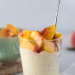 Simple Rice Pudding and Peaches glass cup with rice pudding peaches on top