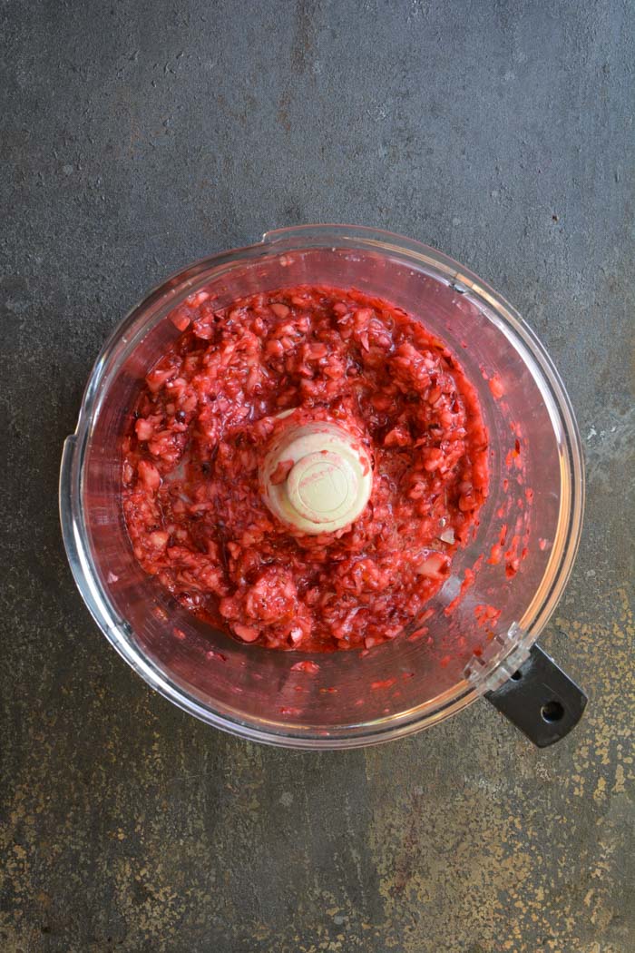 Easy No-Cook Cranberry Apple Relish on food processor after being processed.