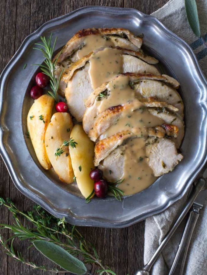 Fresh Herb Crockpot Turkey Breast with Brown Butter Pears on a platter