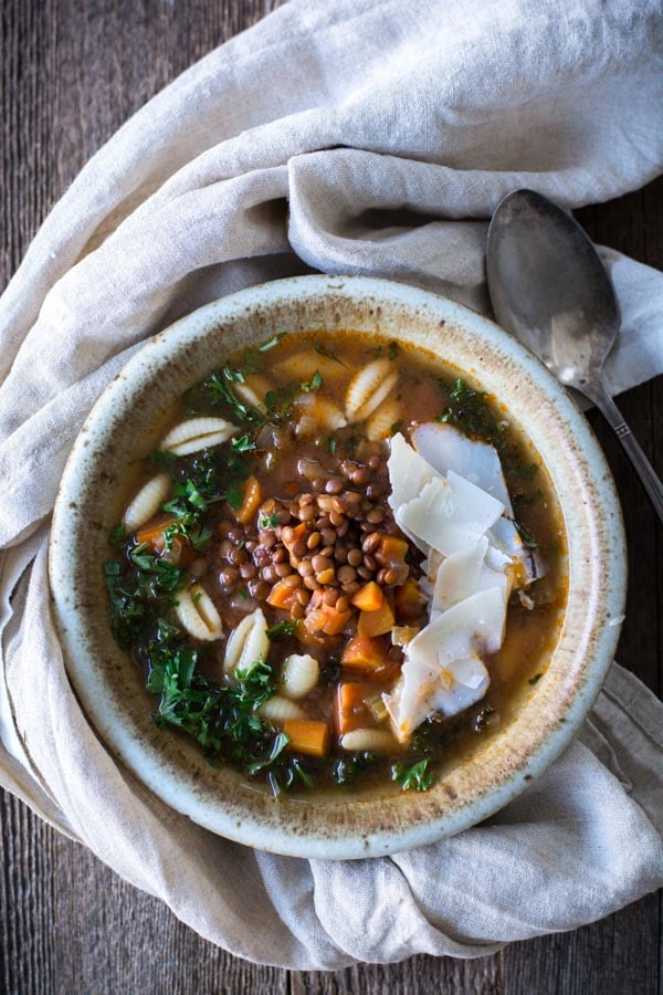 Bowl of slow cooker lentil minestrone soup.