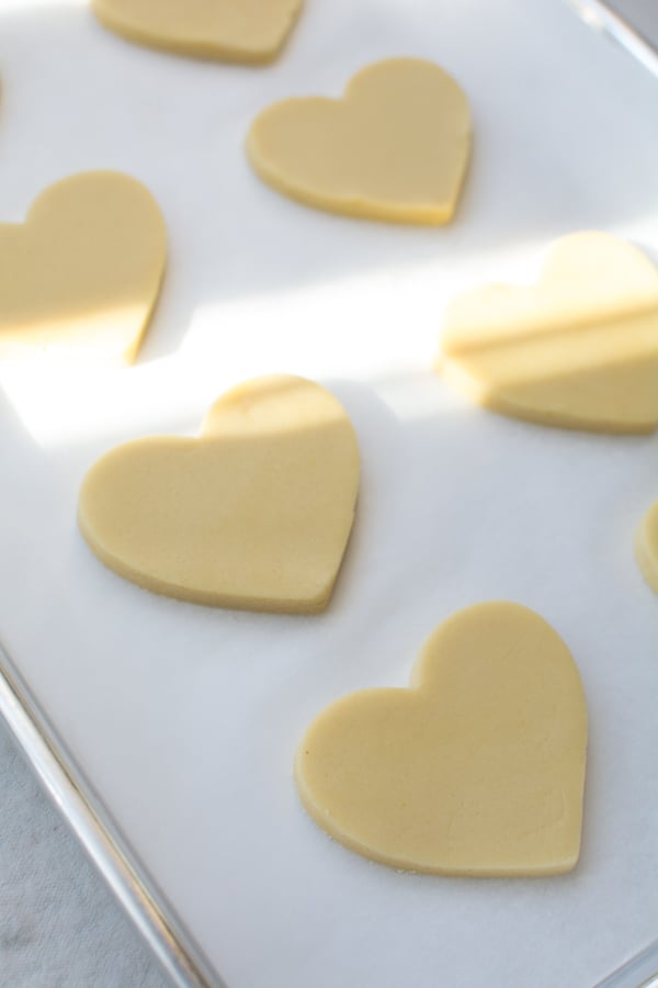 heart shaped cookies on baking sheet