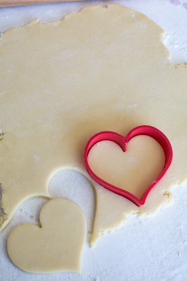 sugar cookie dough with heart cutter